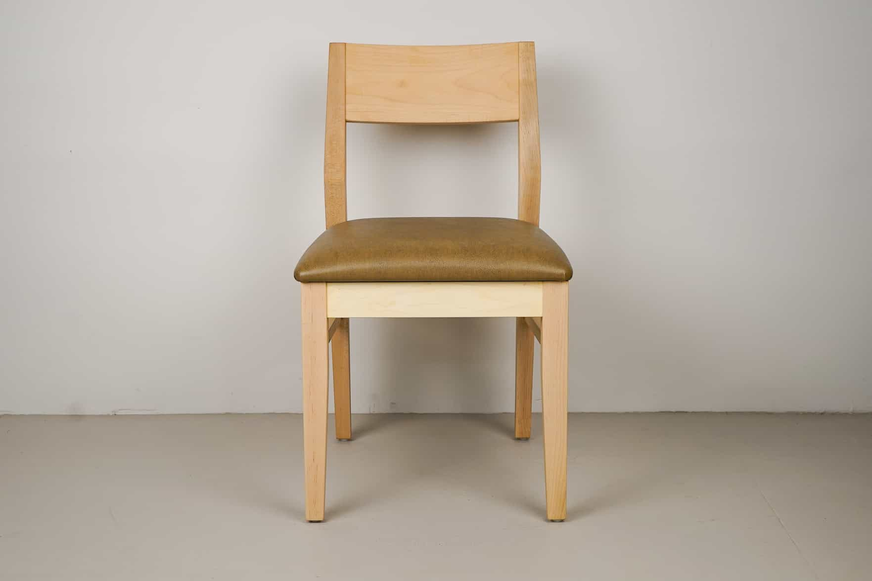 caramel faux leather seat on natural maple chair