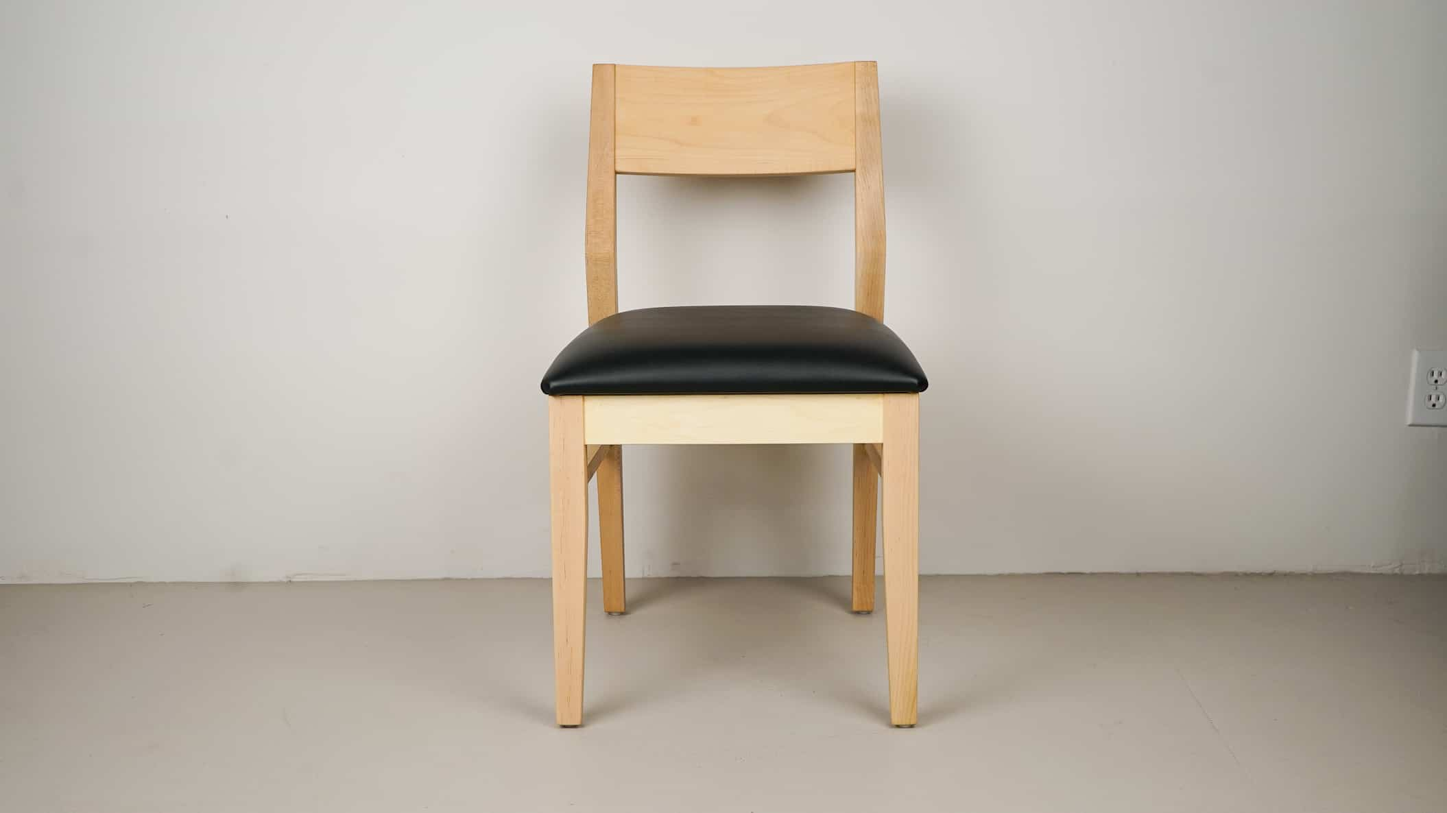 onyx faux leather seat on natural maple chair