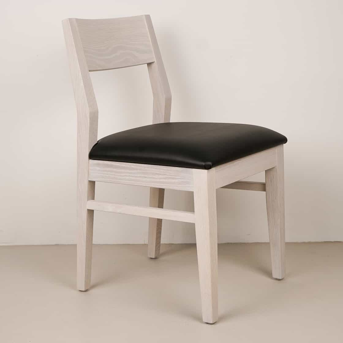 onyx faux leather seat on white oak chair