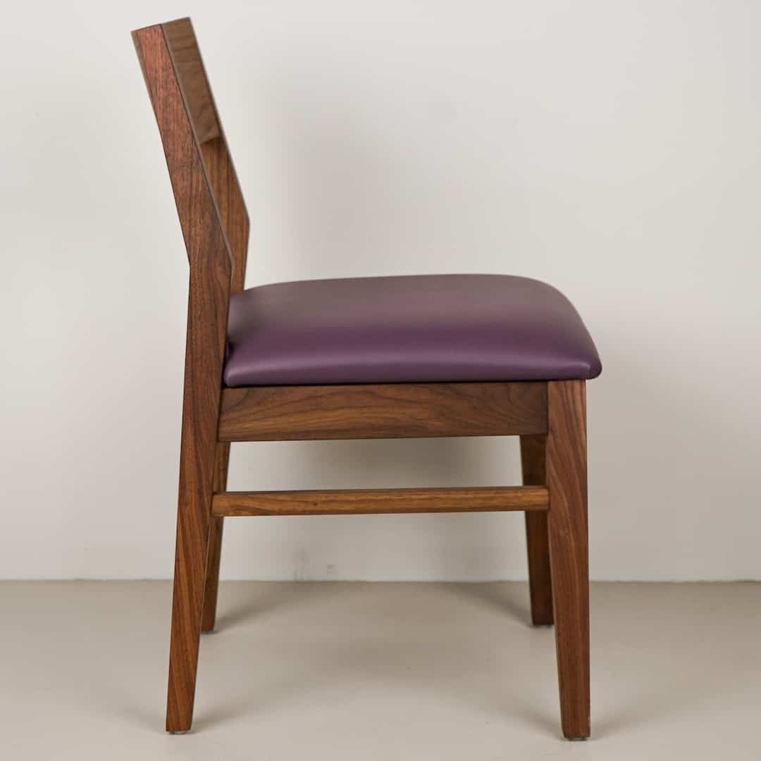 plum faux leather seat on walnut chair