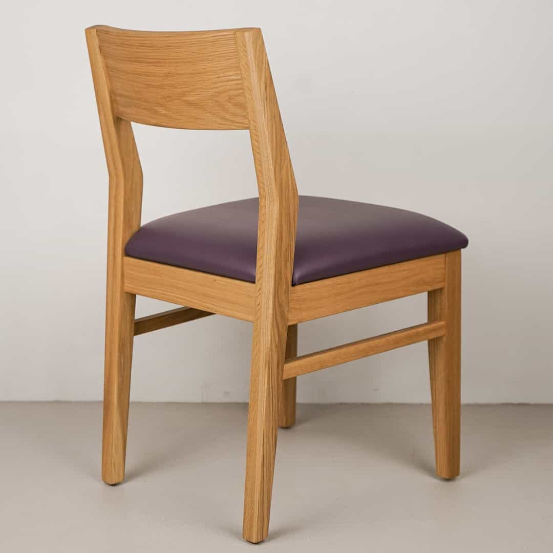 plum faux leather seat on natural oak chair