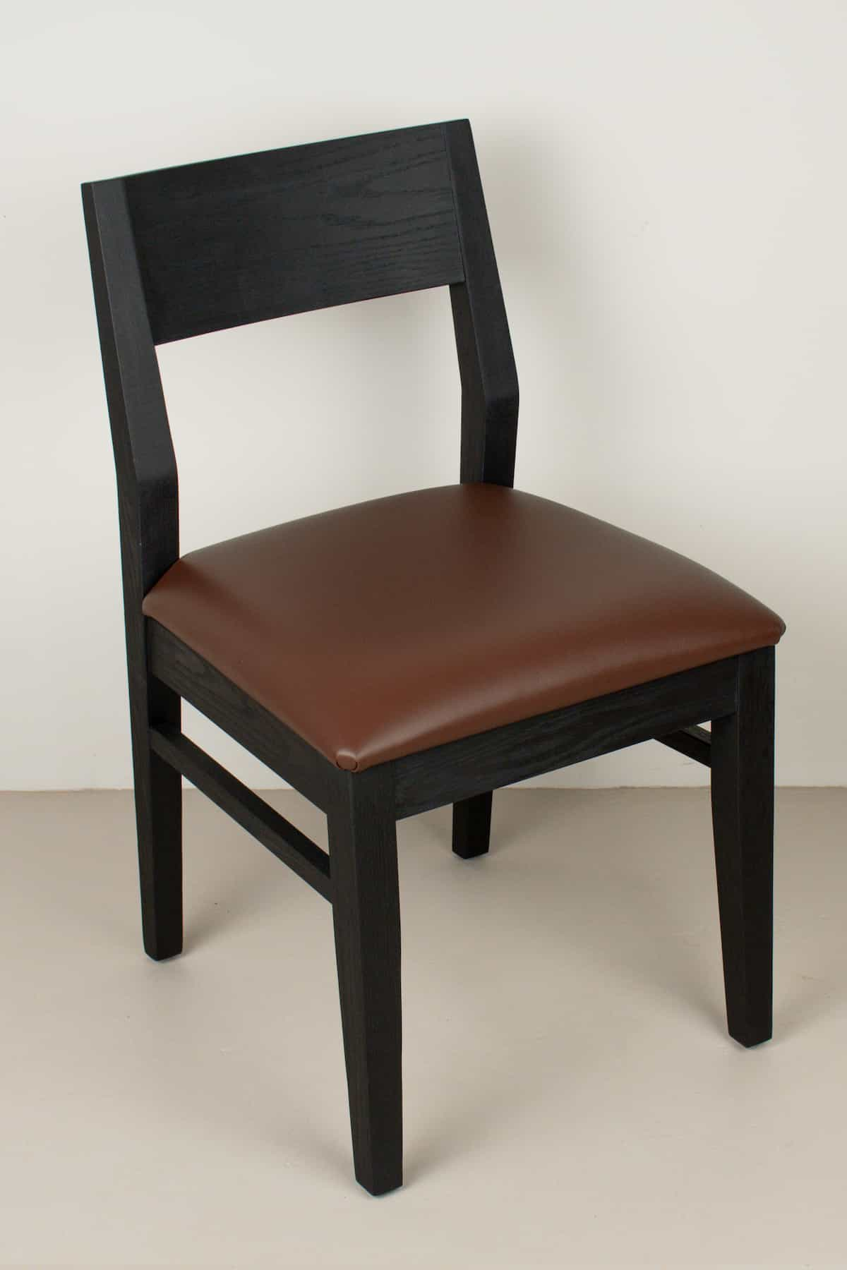 chestnut leather seat on black oak chair