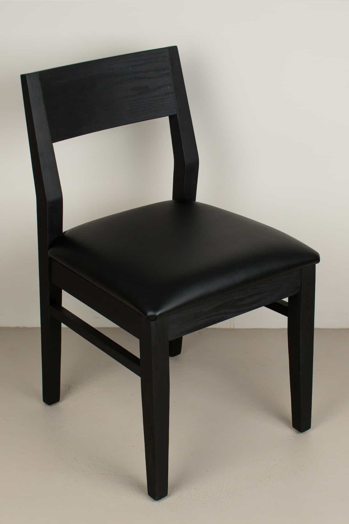 onyx faux leather seat on black oak chair