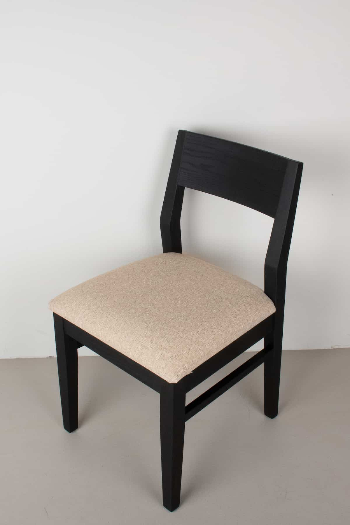 sand fabric seat on black oak chair