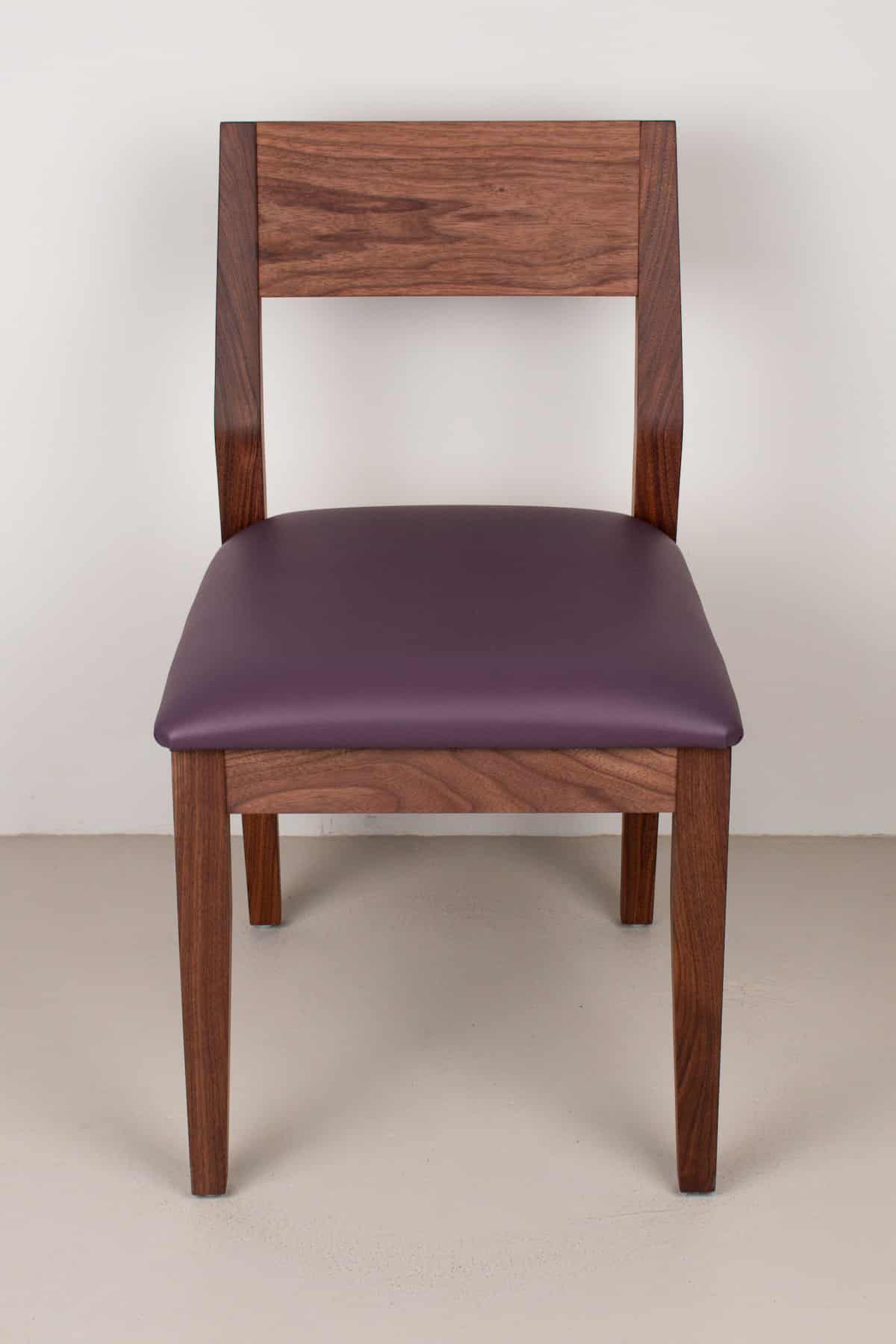 plum faux leather seat on walnut chair