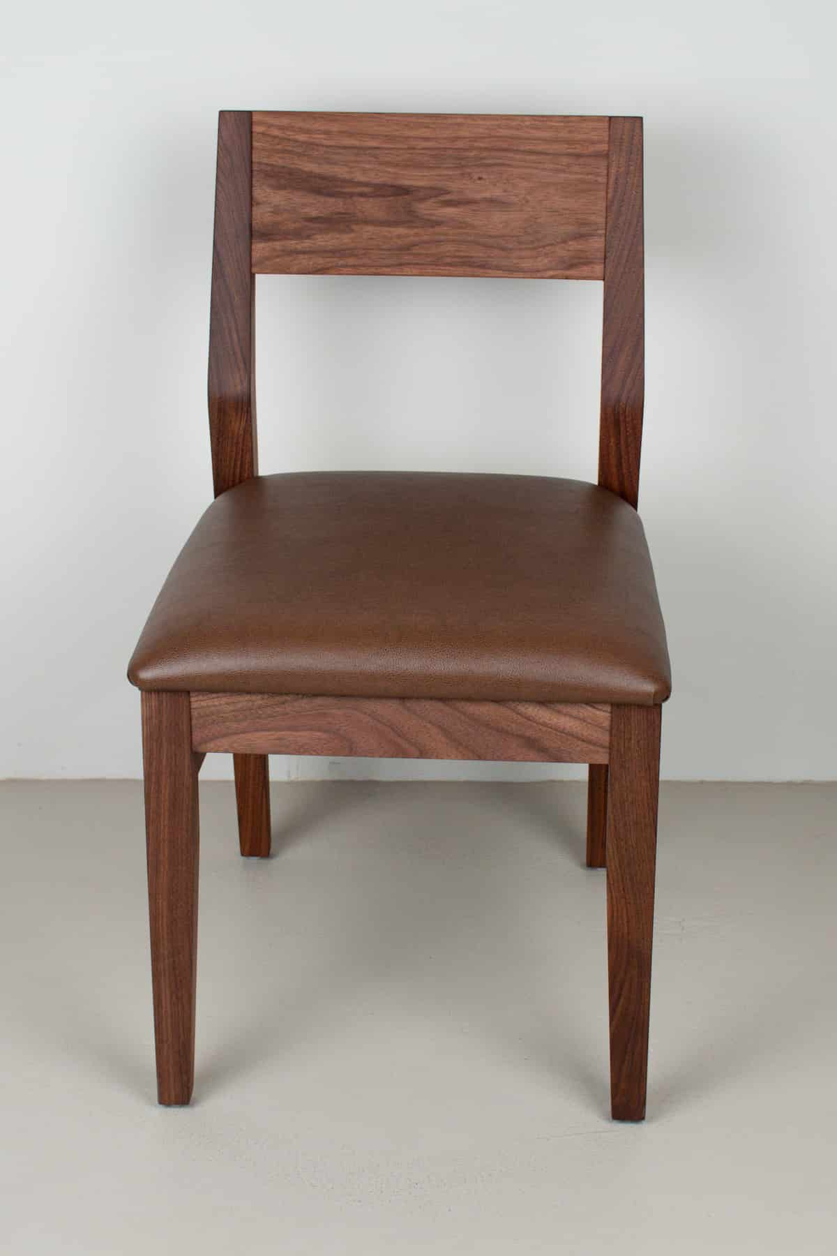 toffee faux leather seat on walnut chair