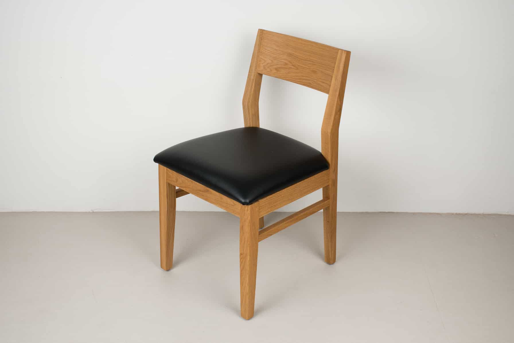 midnight leather seat on natural oak chair