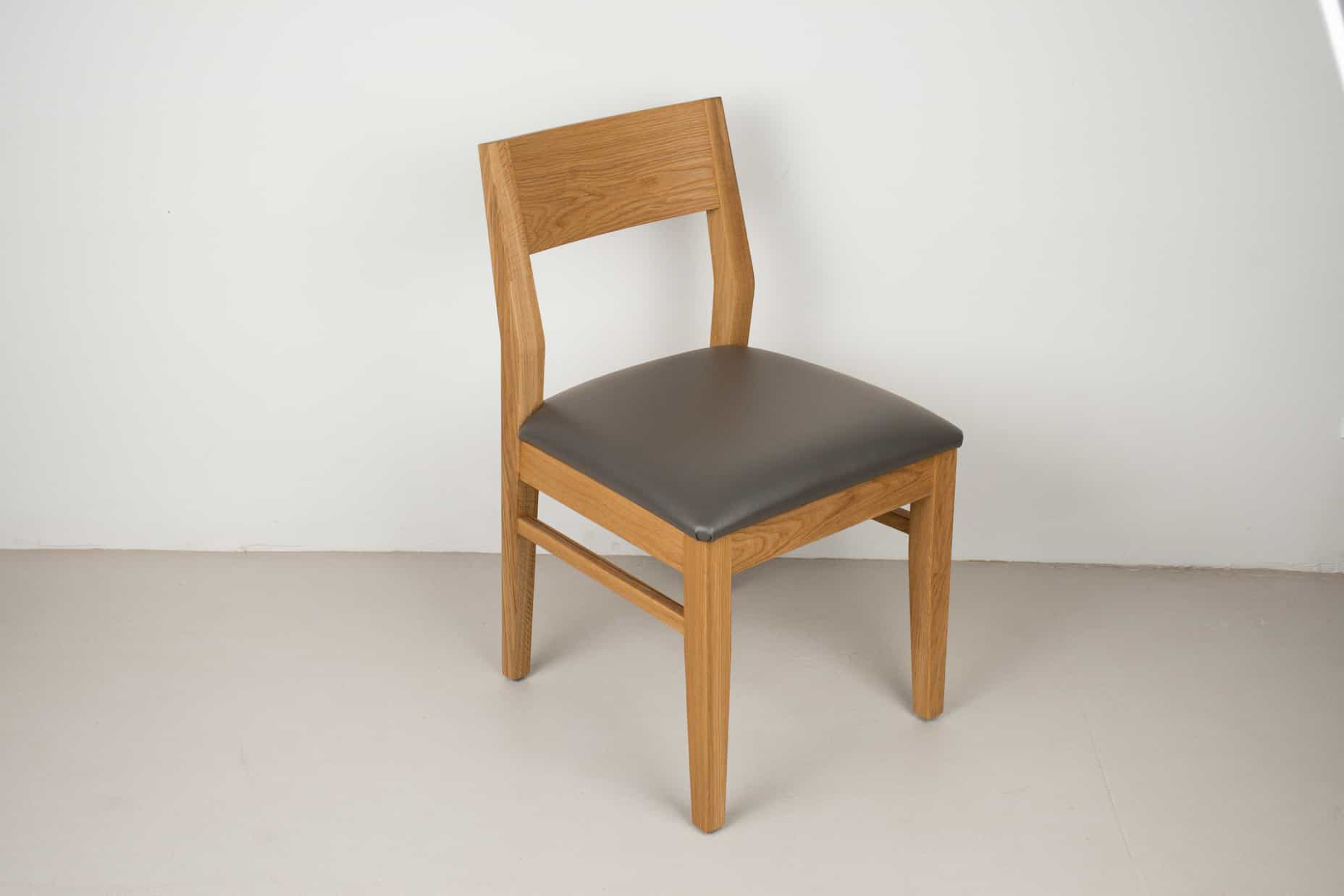 thunder leather seat on natural oak chair