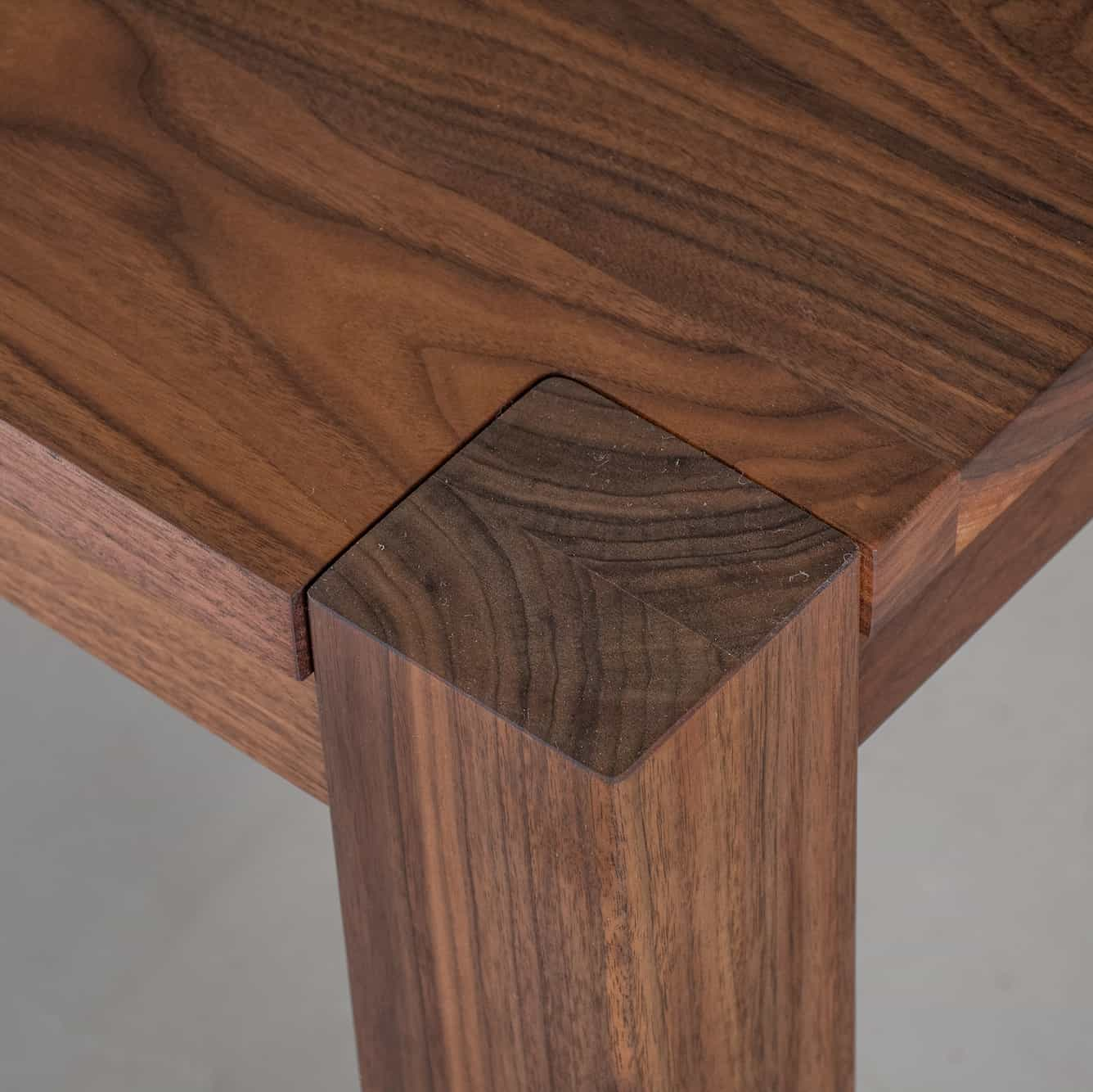 corner detail of walnut extension table