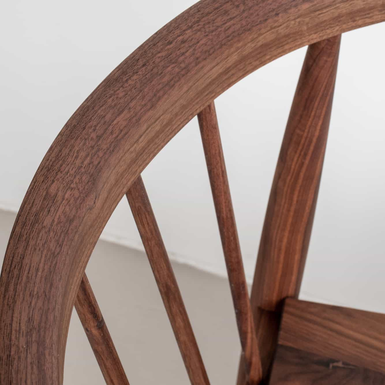 detail of wood dining chair back