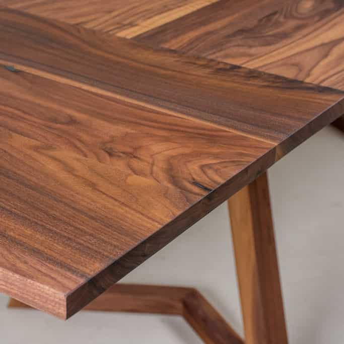 leaf detail in a walnut extension table