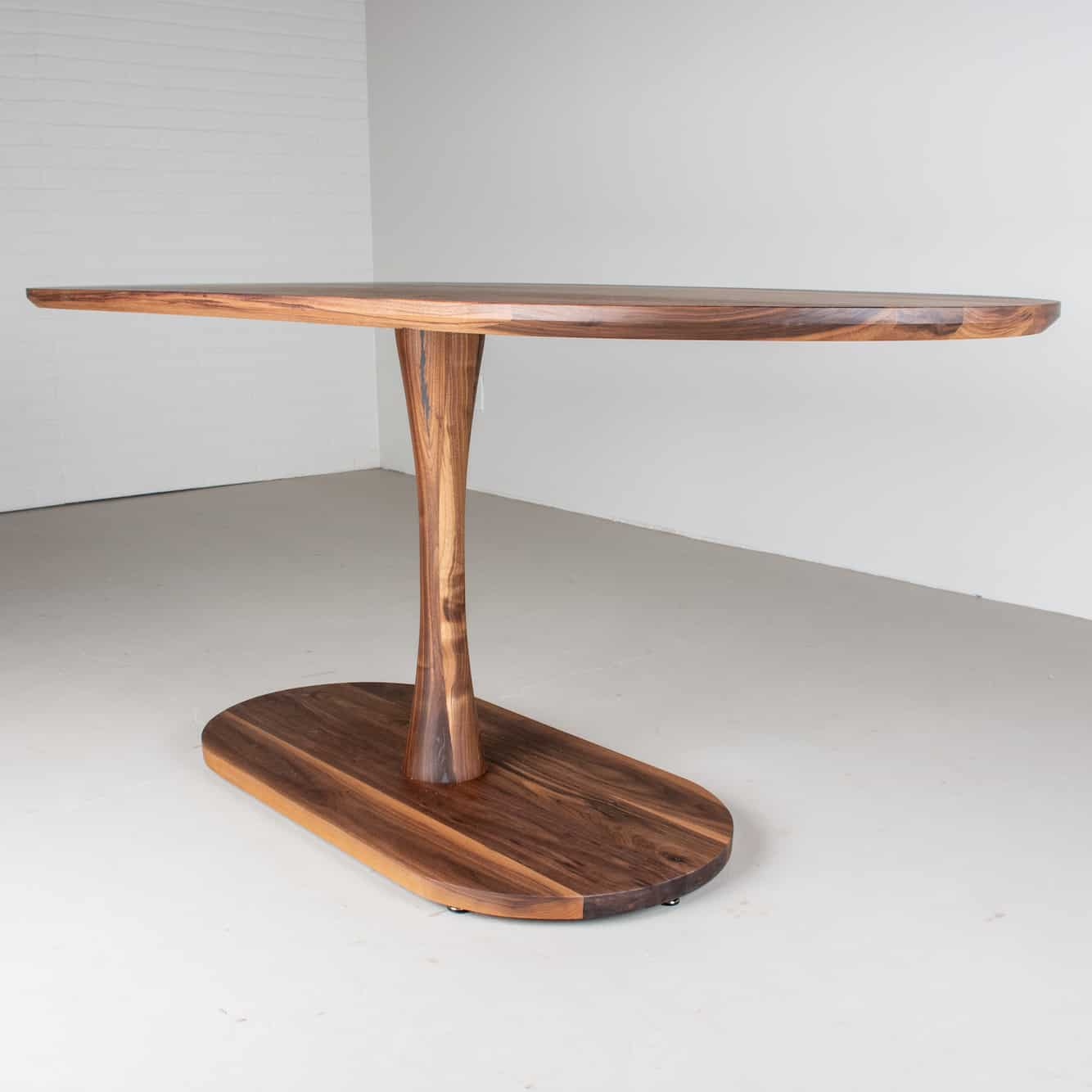 oval walnut pedestal table