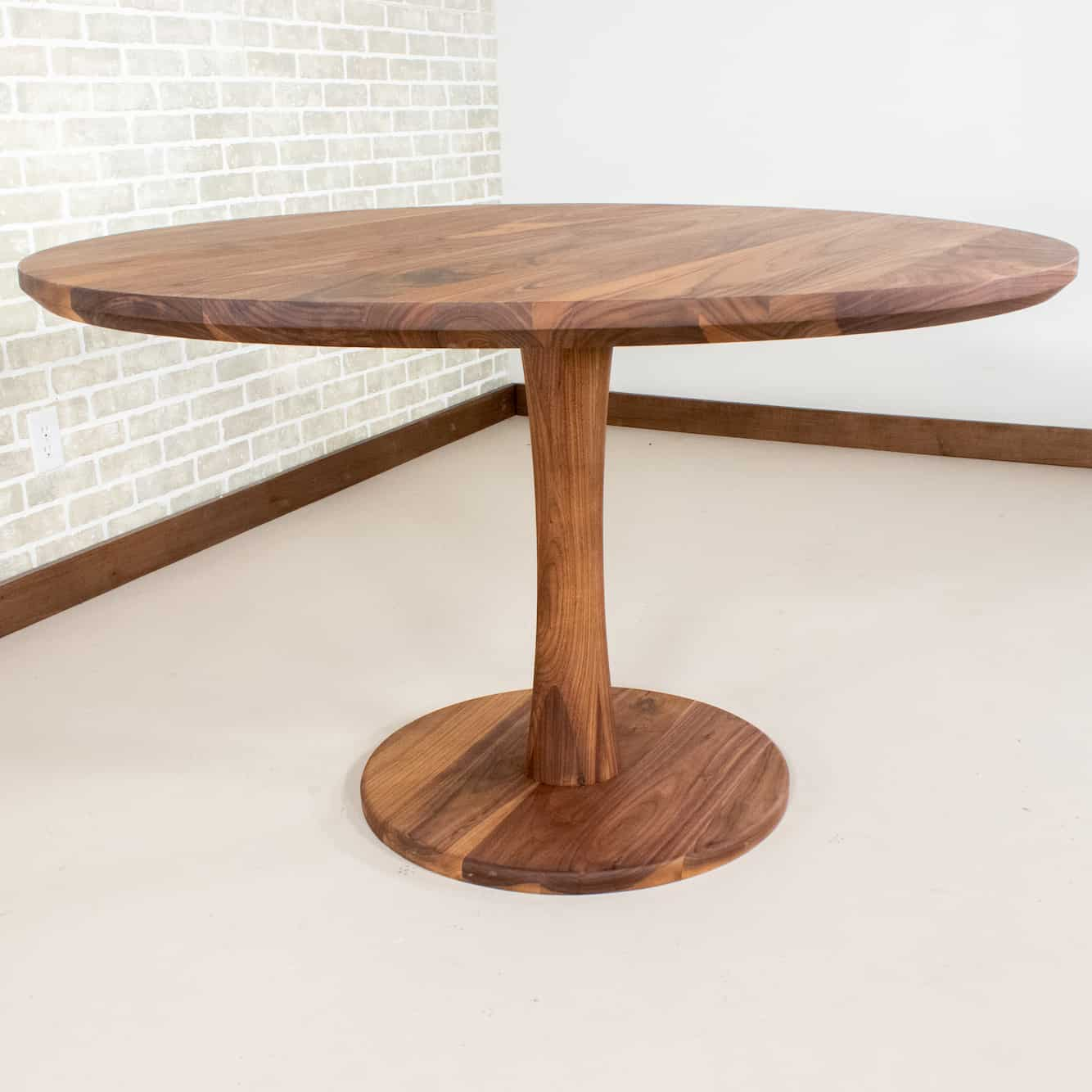 round walnut pedestal table