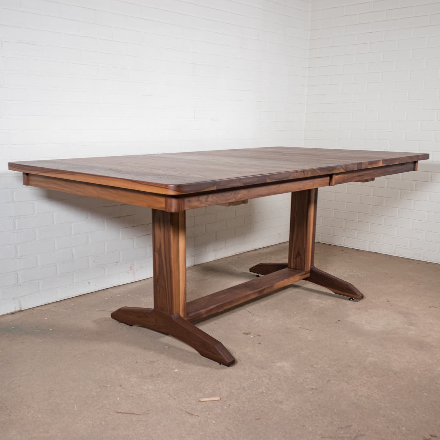 walnut extendable trestle table