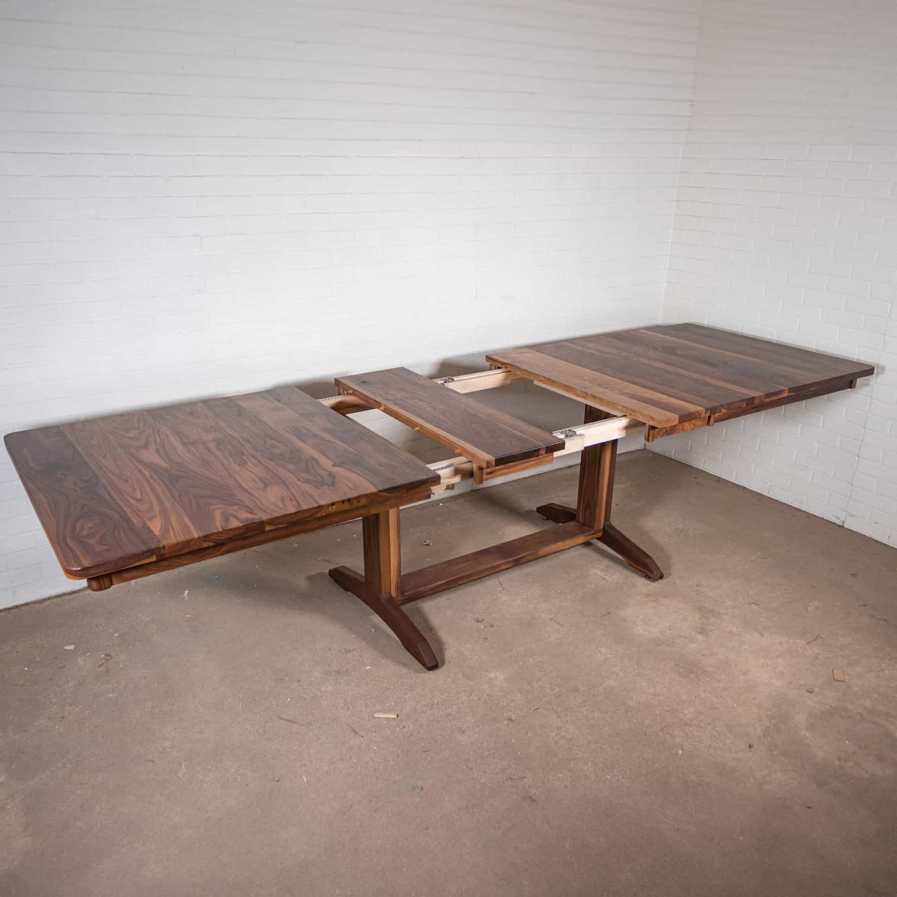 walnut extendable trestle table