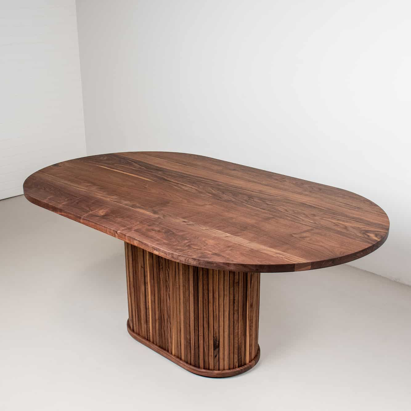 oval walnut pedestal table