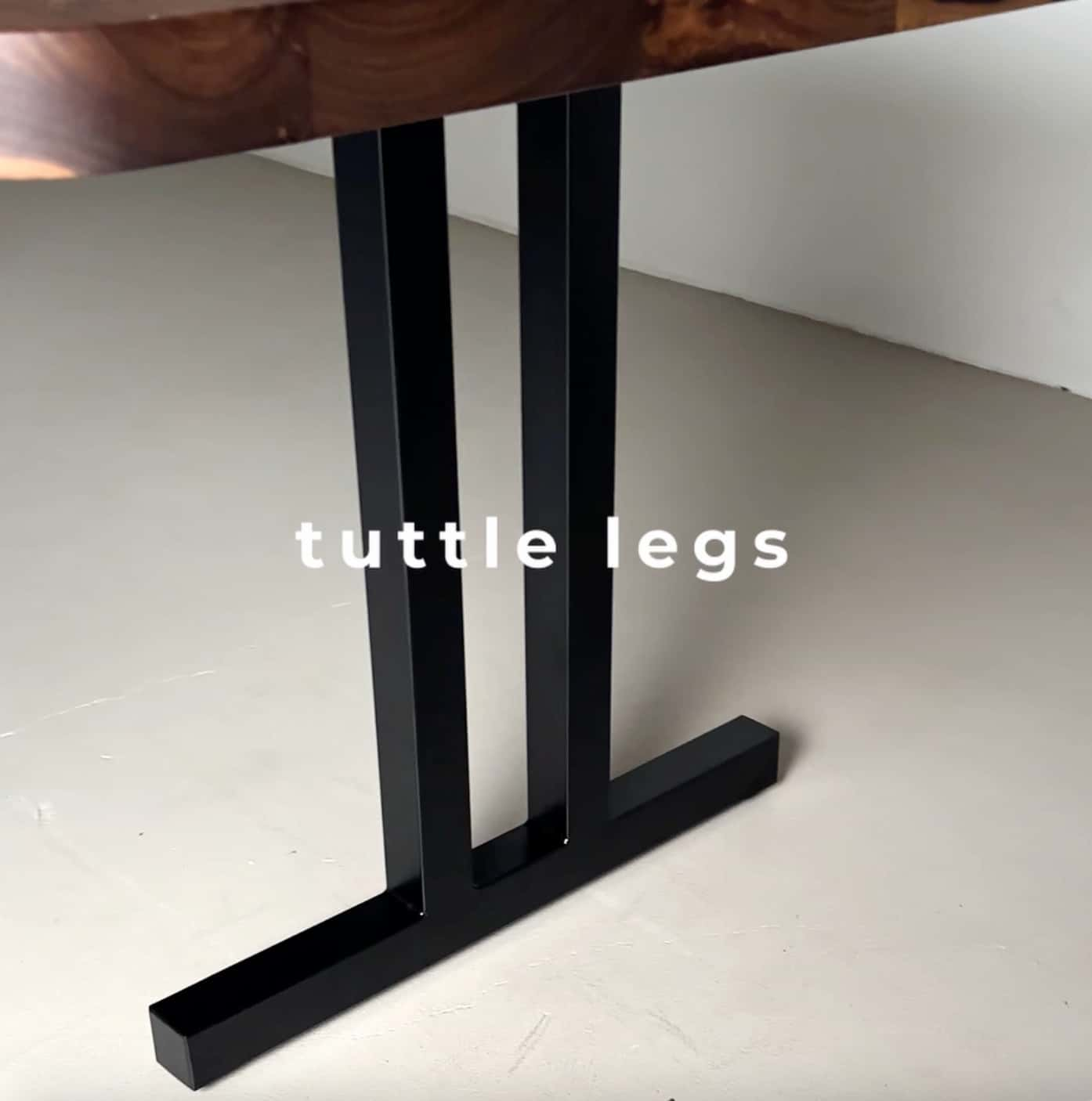 wood dining table on steel legs