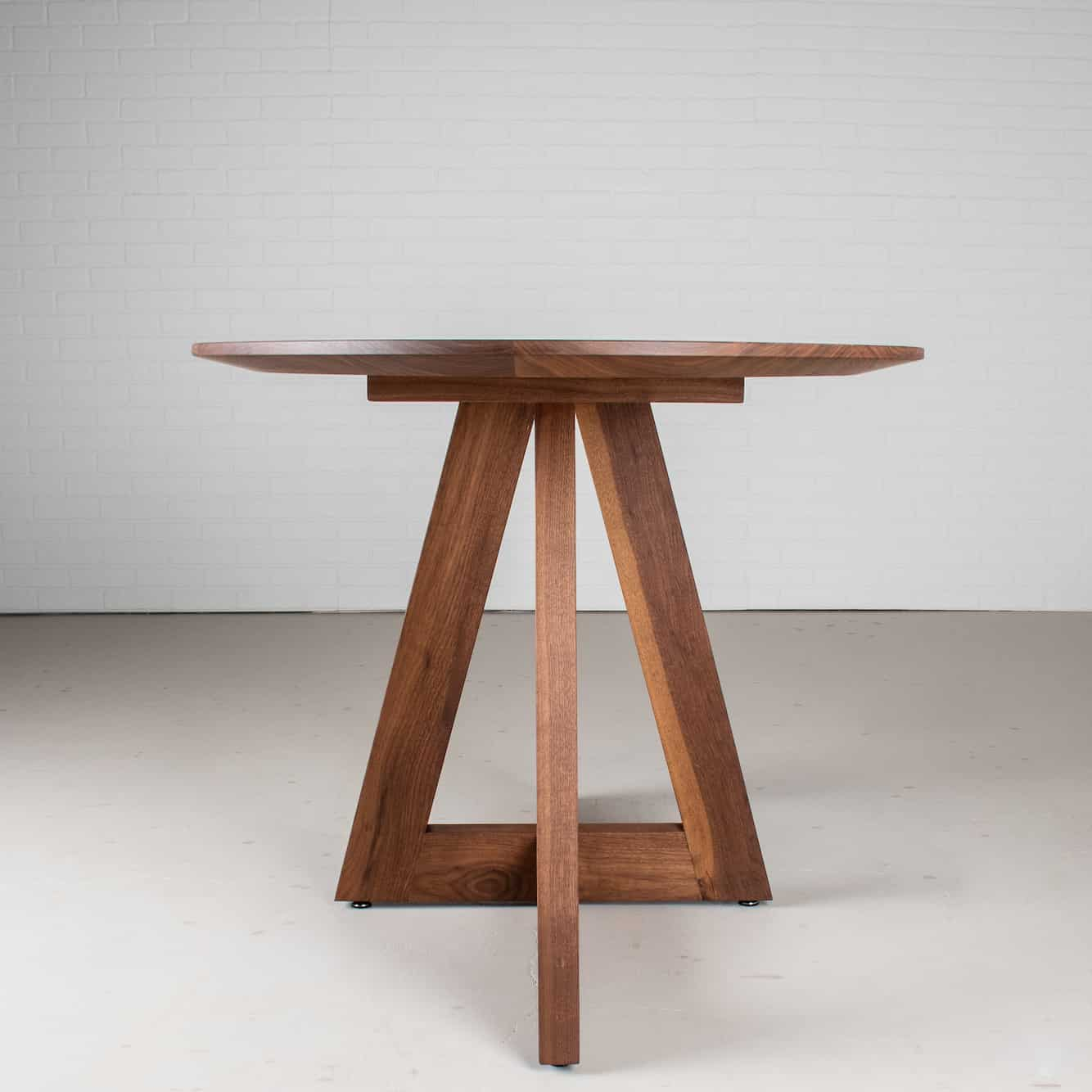 walnut elliptical oval pedestal table