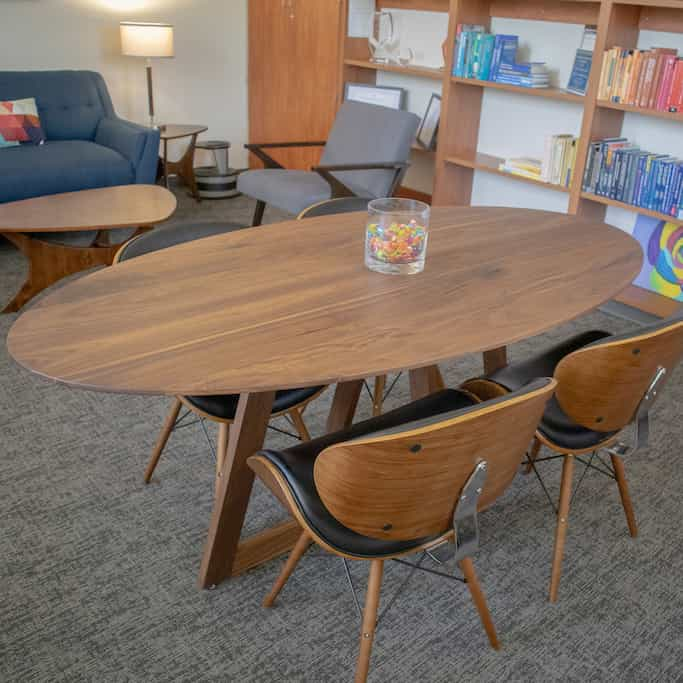 walnut elliptical oval pedestal table