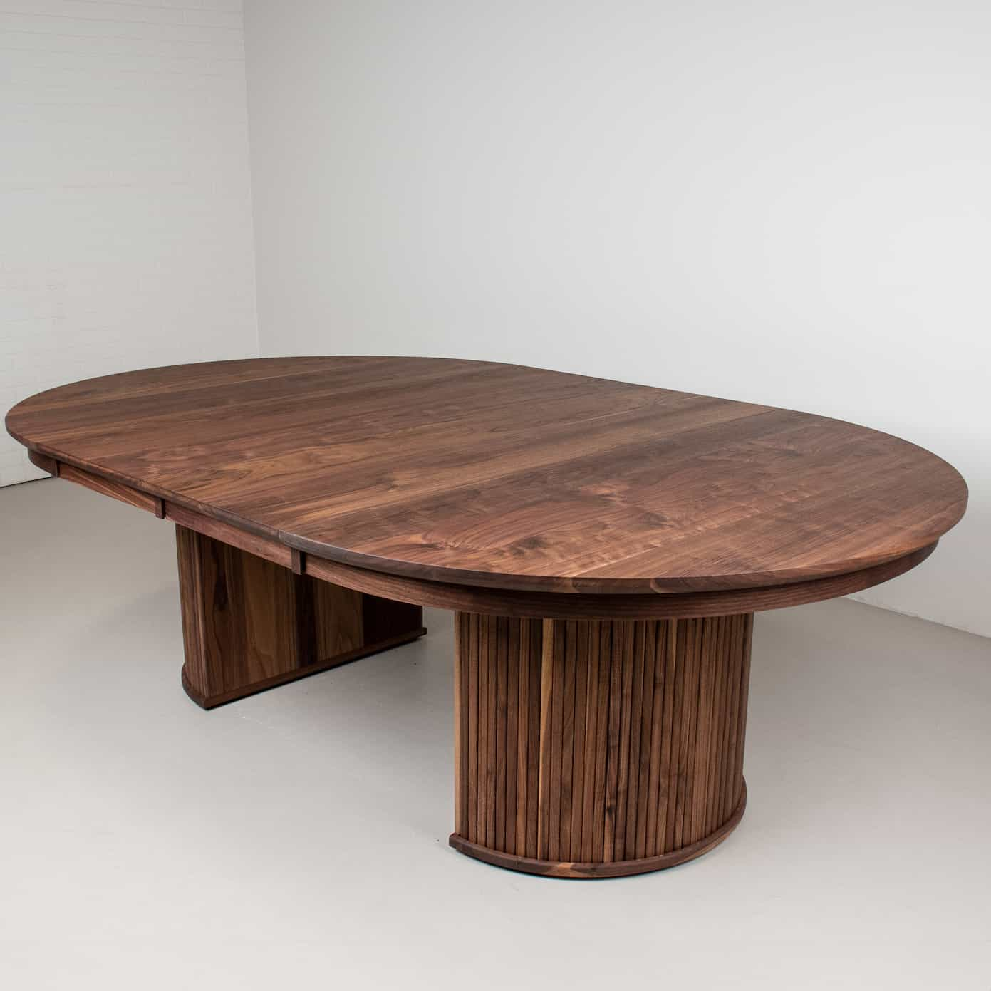 round walnut extendable pedestal table