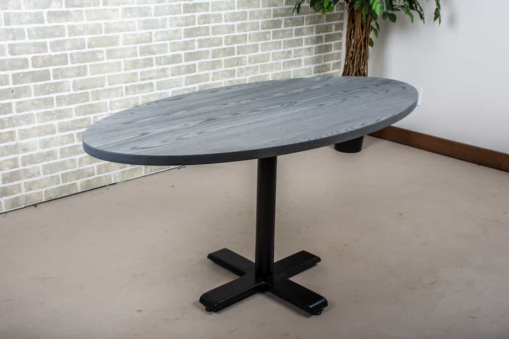 ash oval table in iron on bistro base