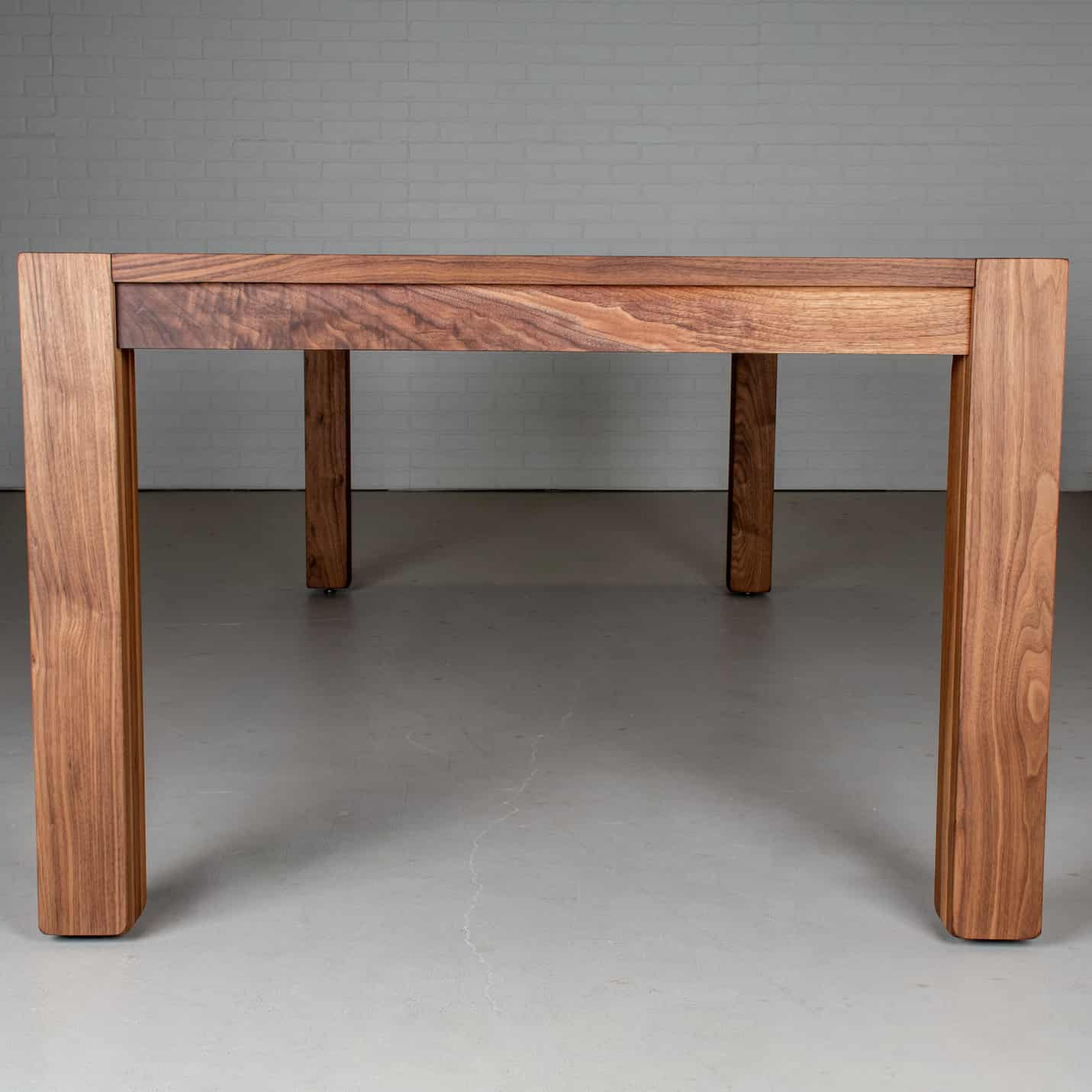 end view of walnut center extension table