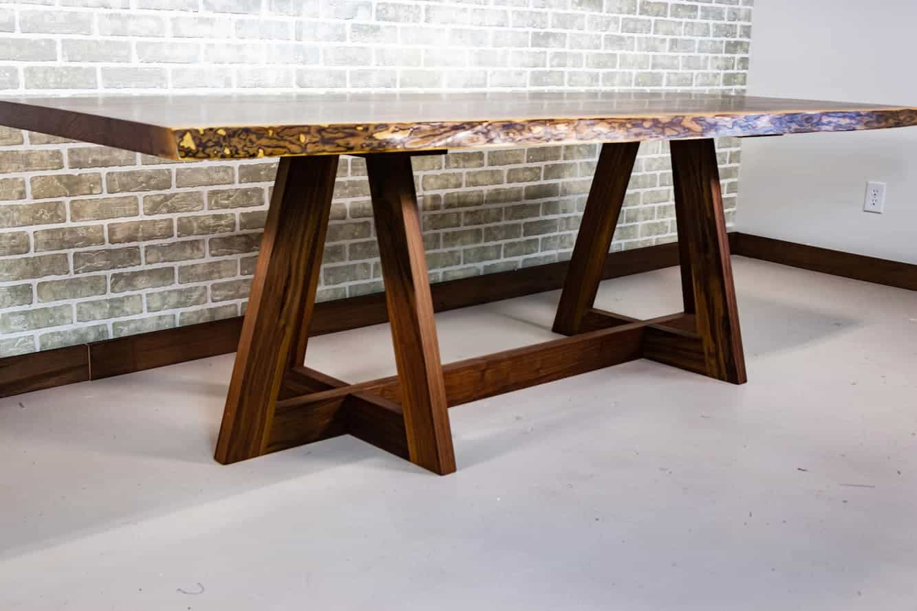 bookmatch walnut table on kelly base