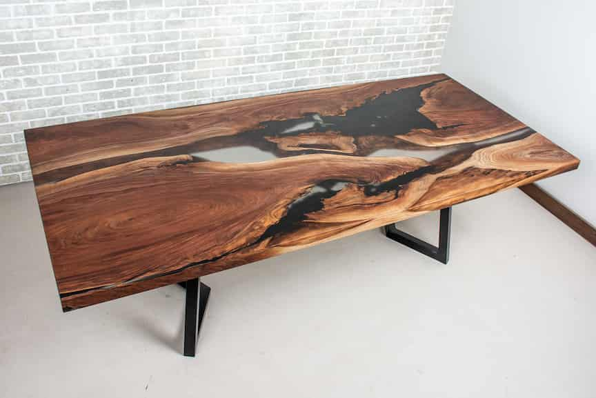 walnut river table with clear and black epoxy