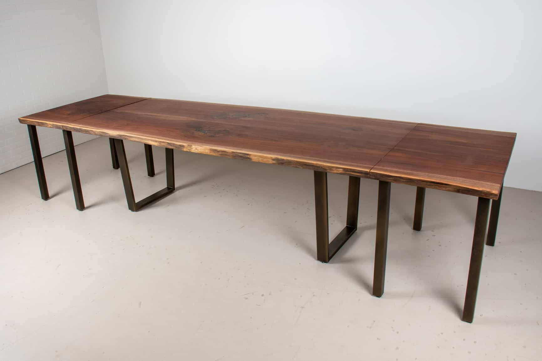 extendable bookmatch walnut table