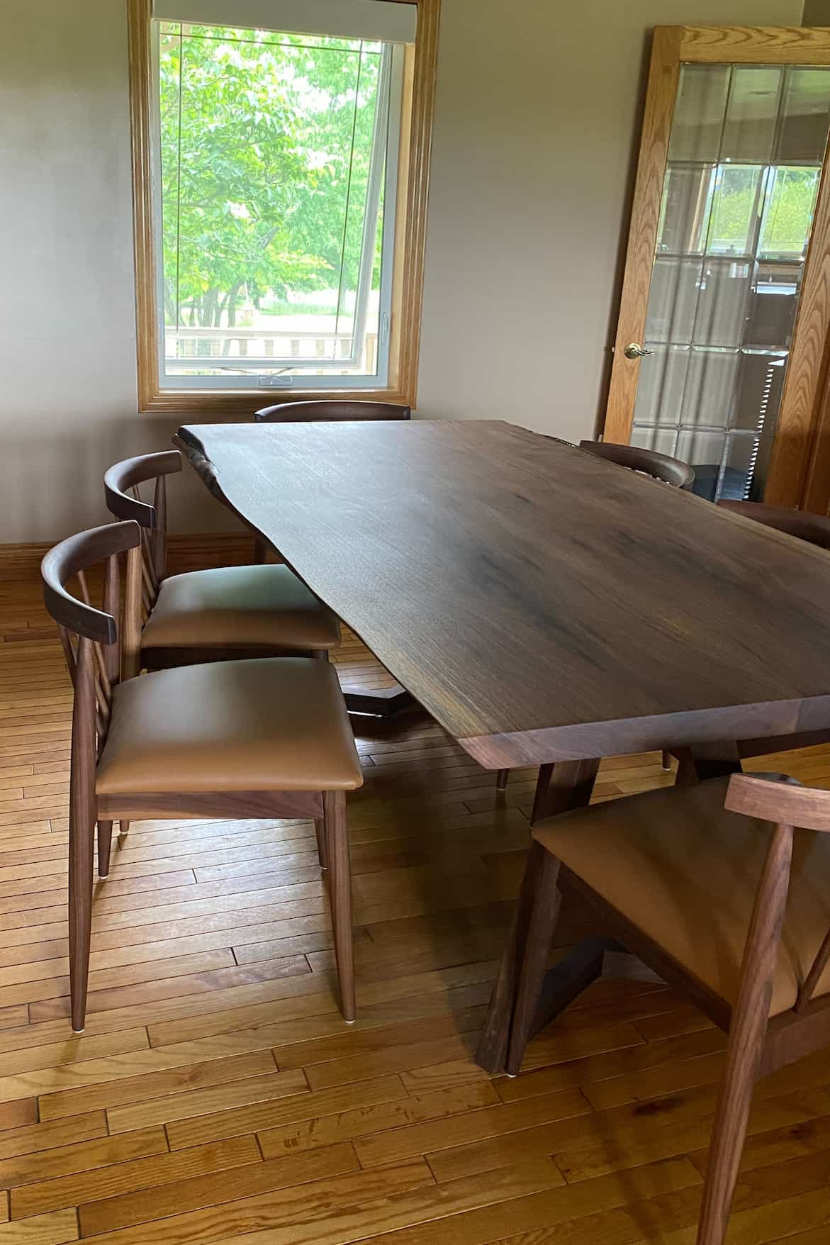 live edge walnut table with dining chairs