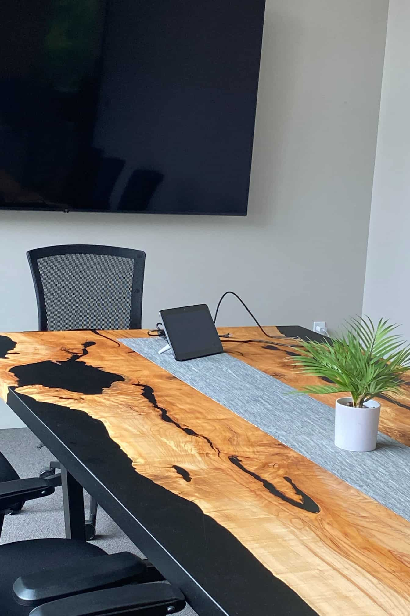 custom maple conference table with granite inlay