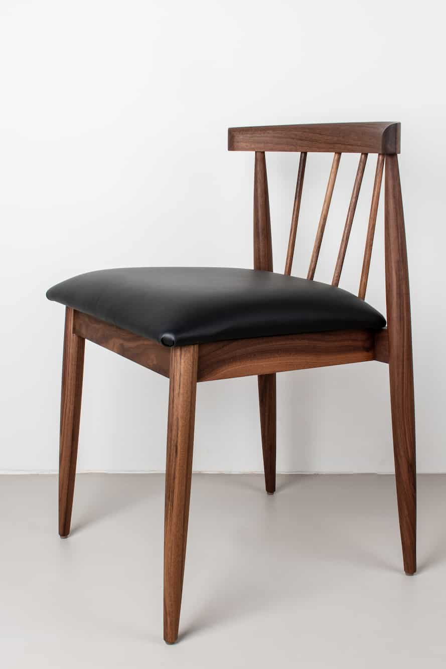 mcm dining chair with black leather seat