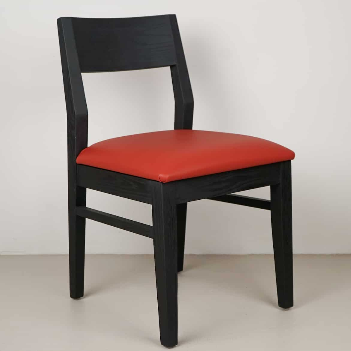 black dining chair with red seat