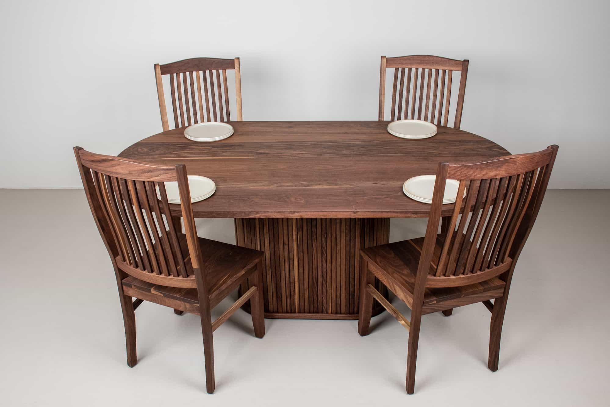 oval pedestal table with chairs