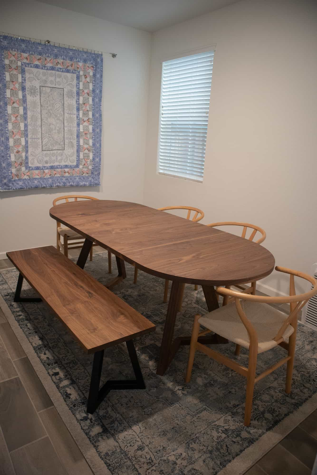 oval dining table with bench