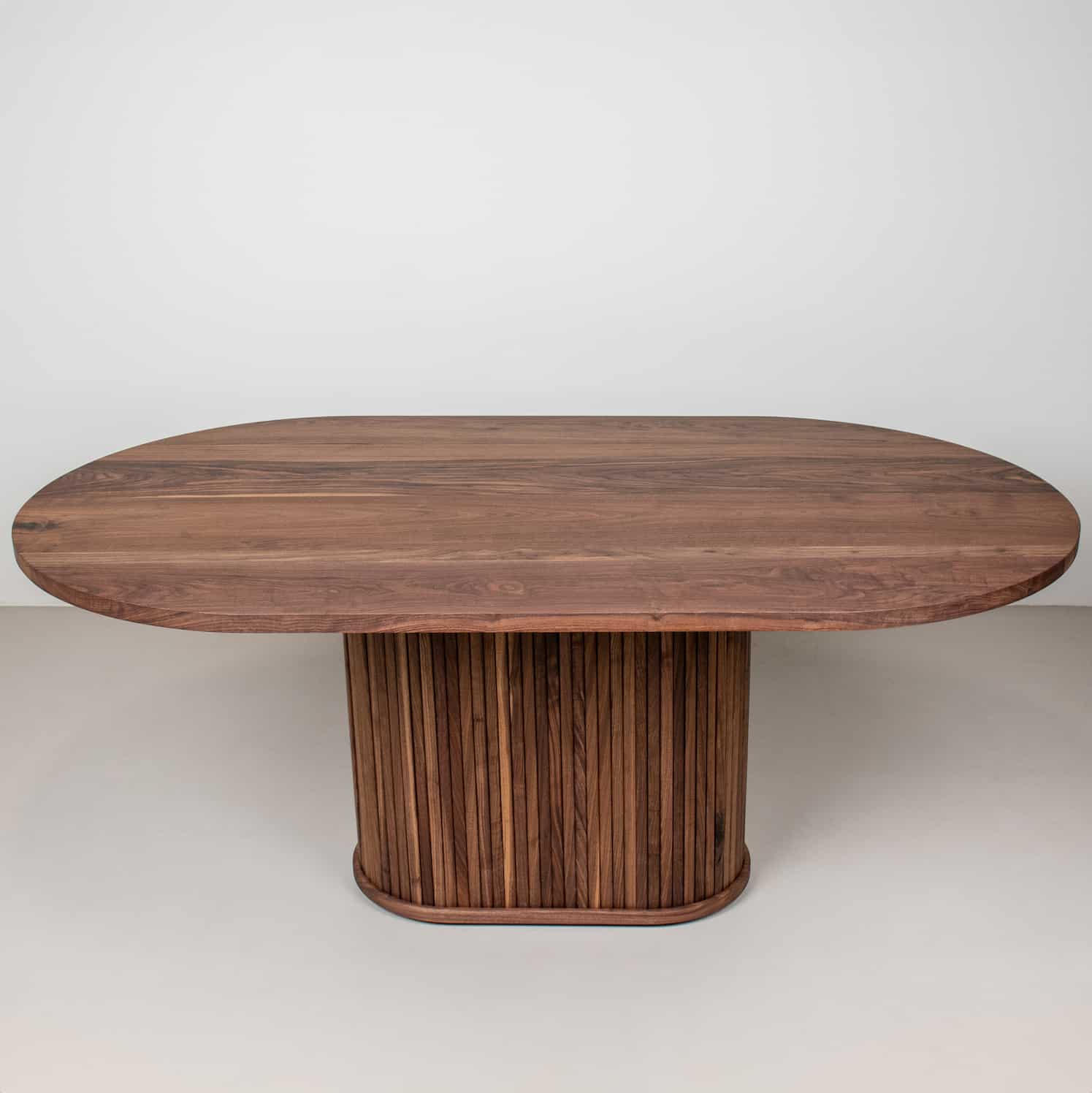 oval walnut pedestal table