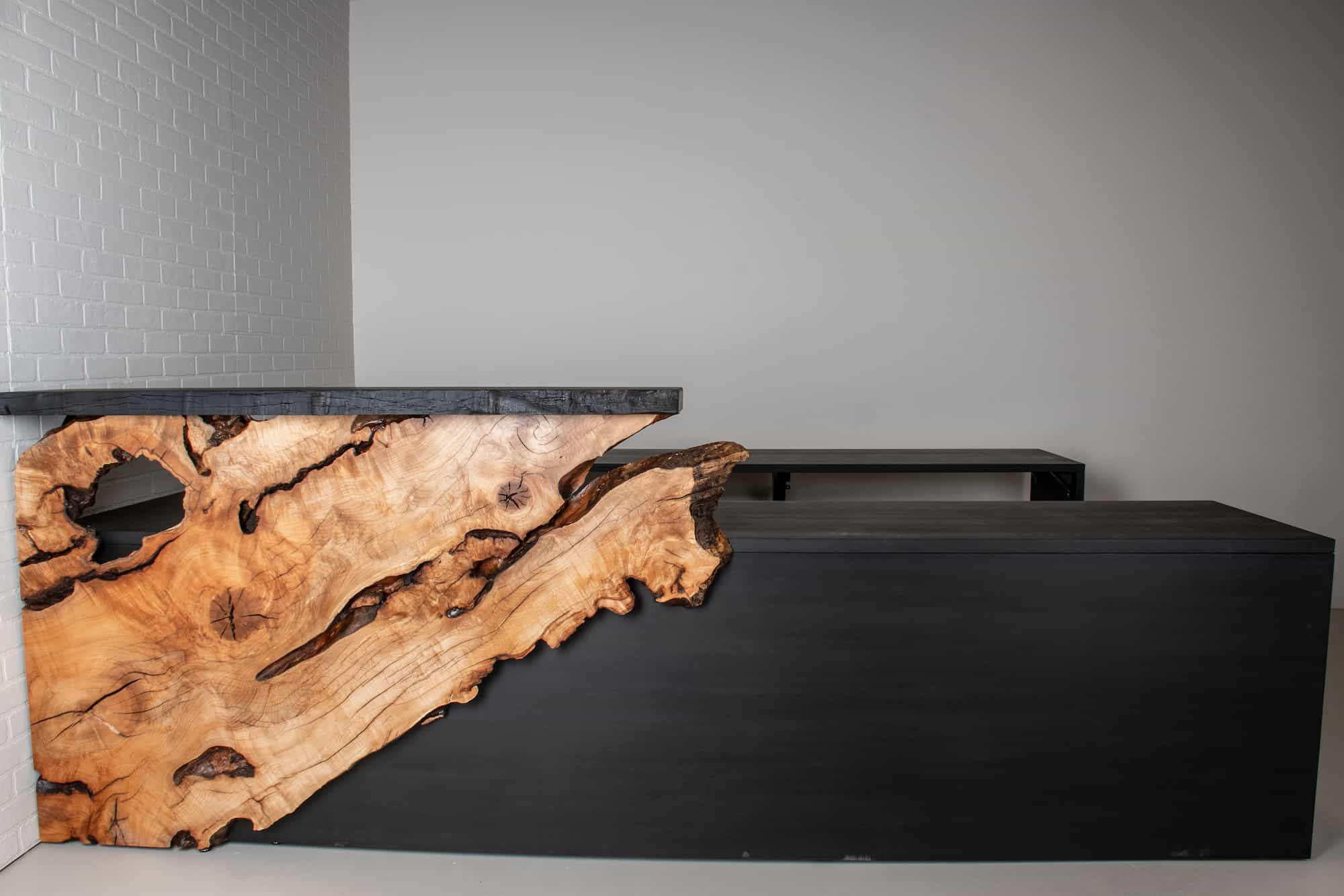 reception desk with live edge maple accent