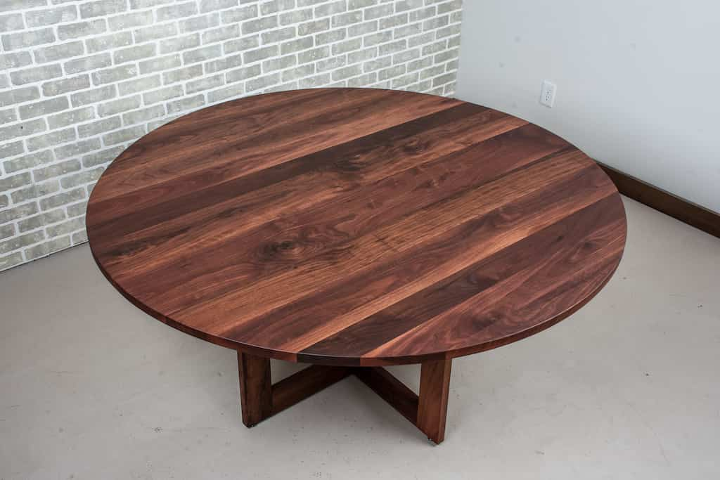 round table with spiced finish