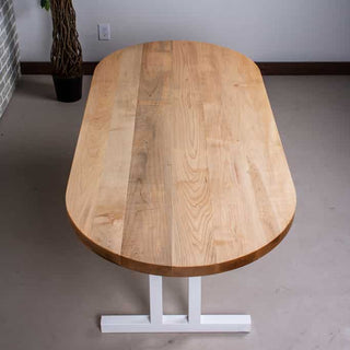 oval wood table on steel legs