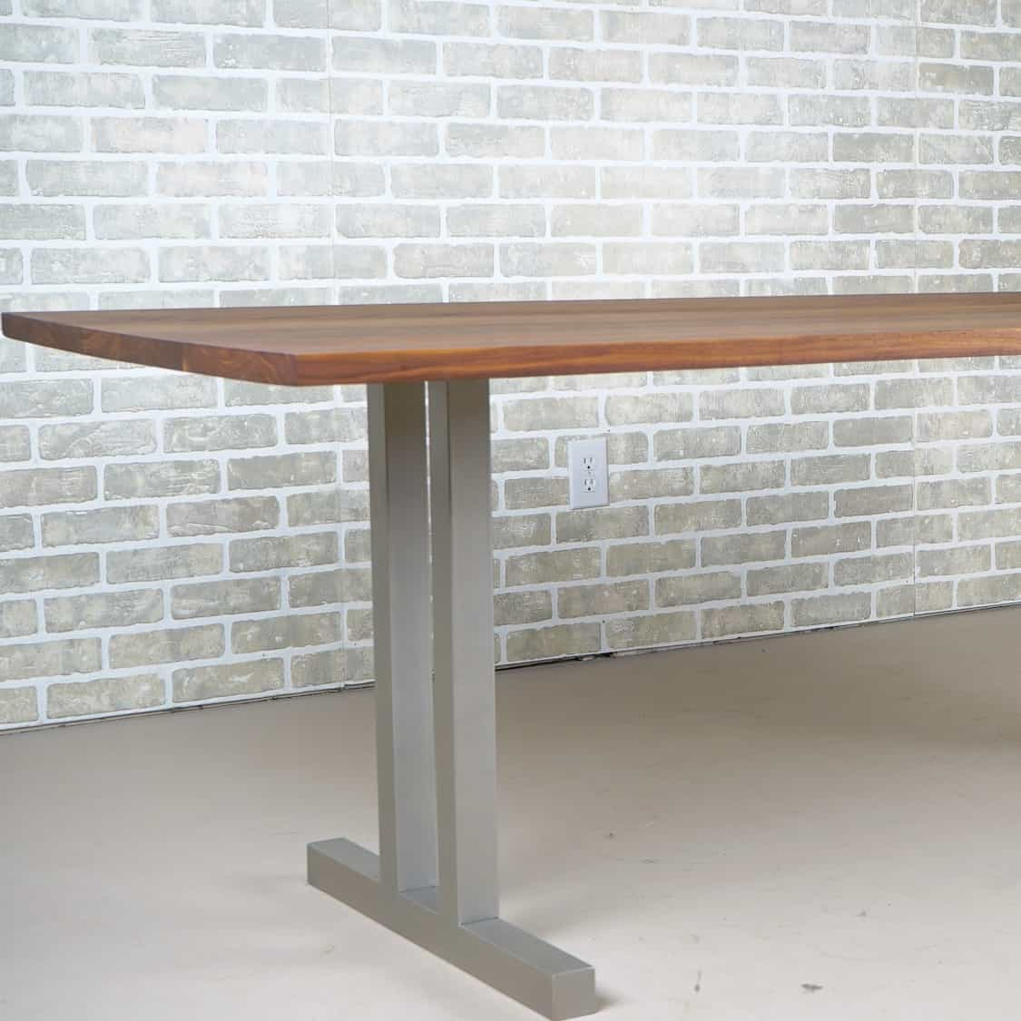 wood dining table on steel legs