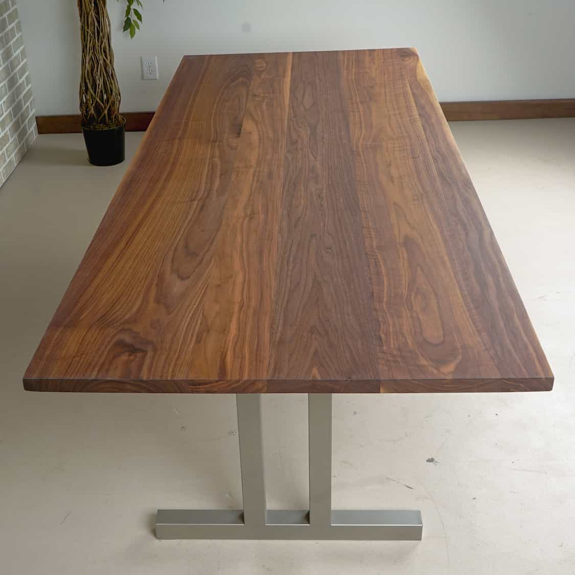 wood dining table on steel legs