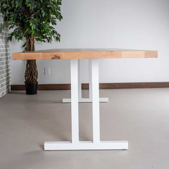 wood dining table on steel legs