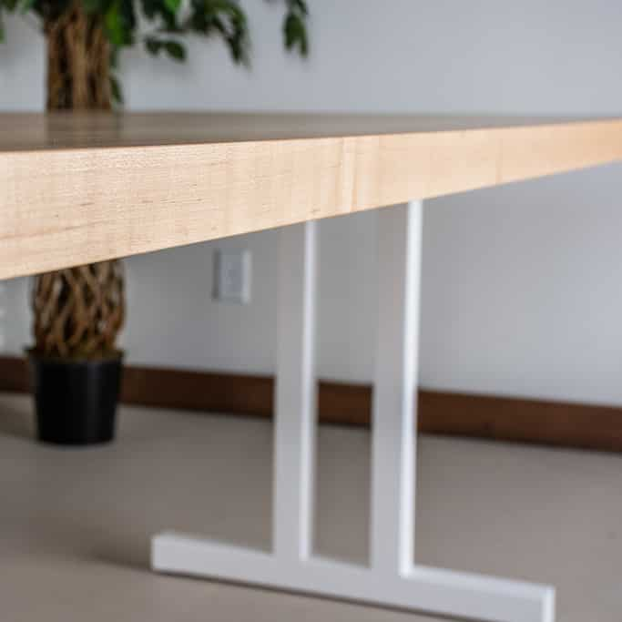 wood dining table on steel legs