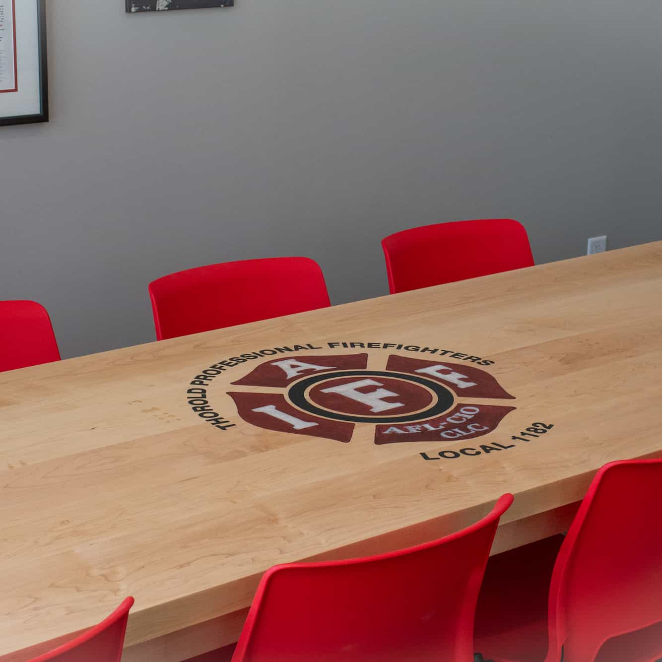 solid maple conference table with epoxy logo