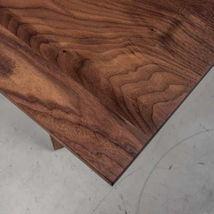 corner of a square wood table