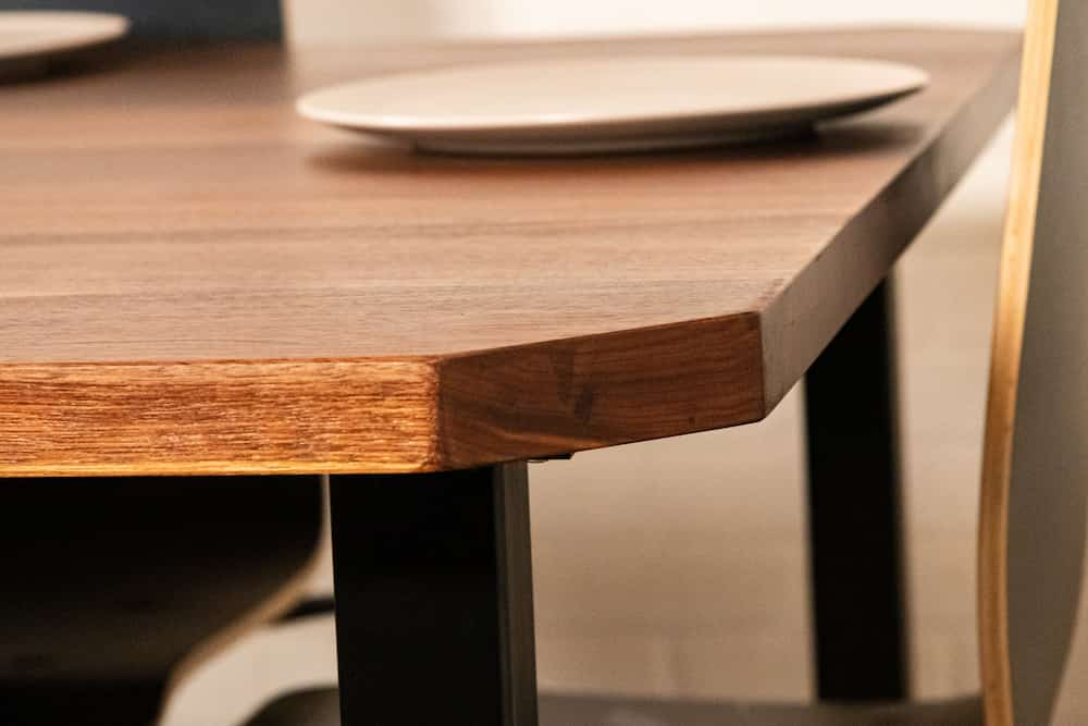 square walnut table with clipped corners