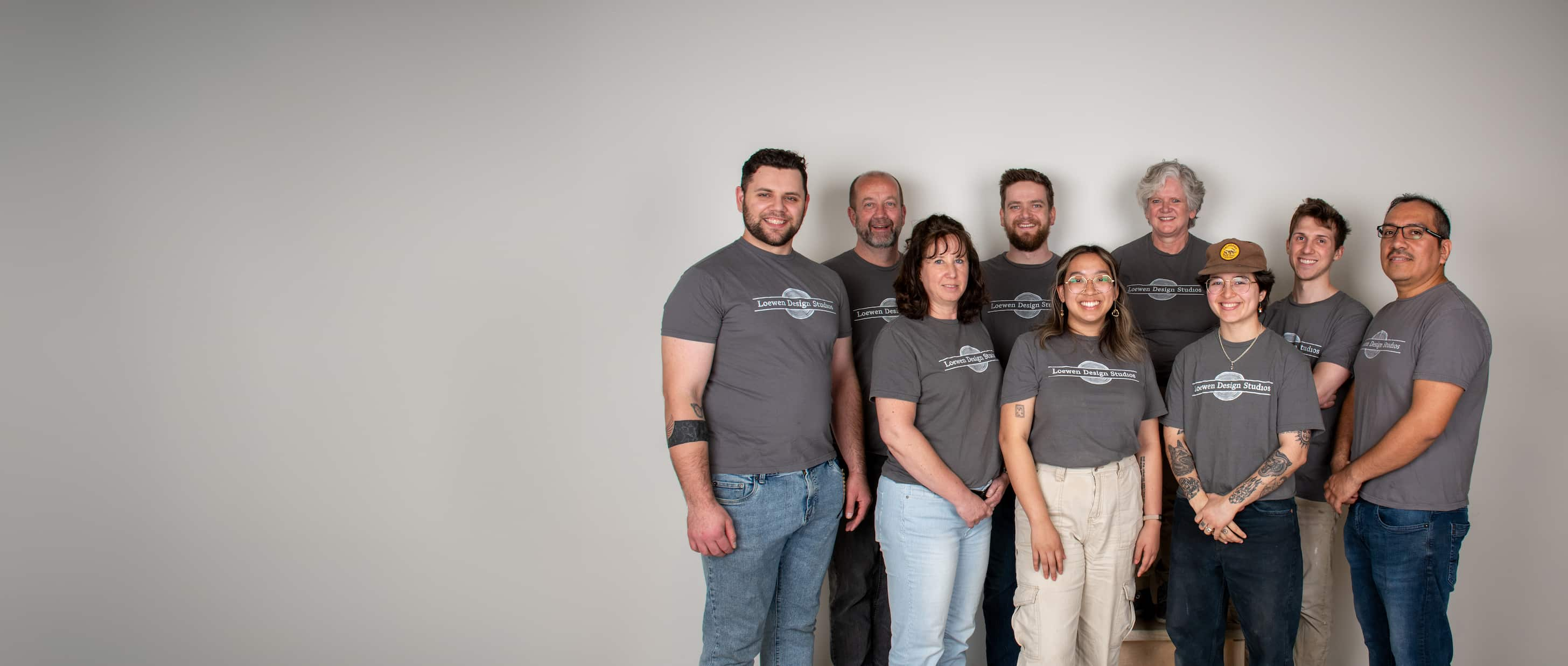 Our Loewen Design Studios team members pose for a family photo