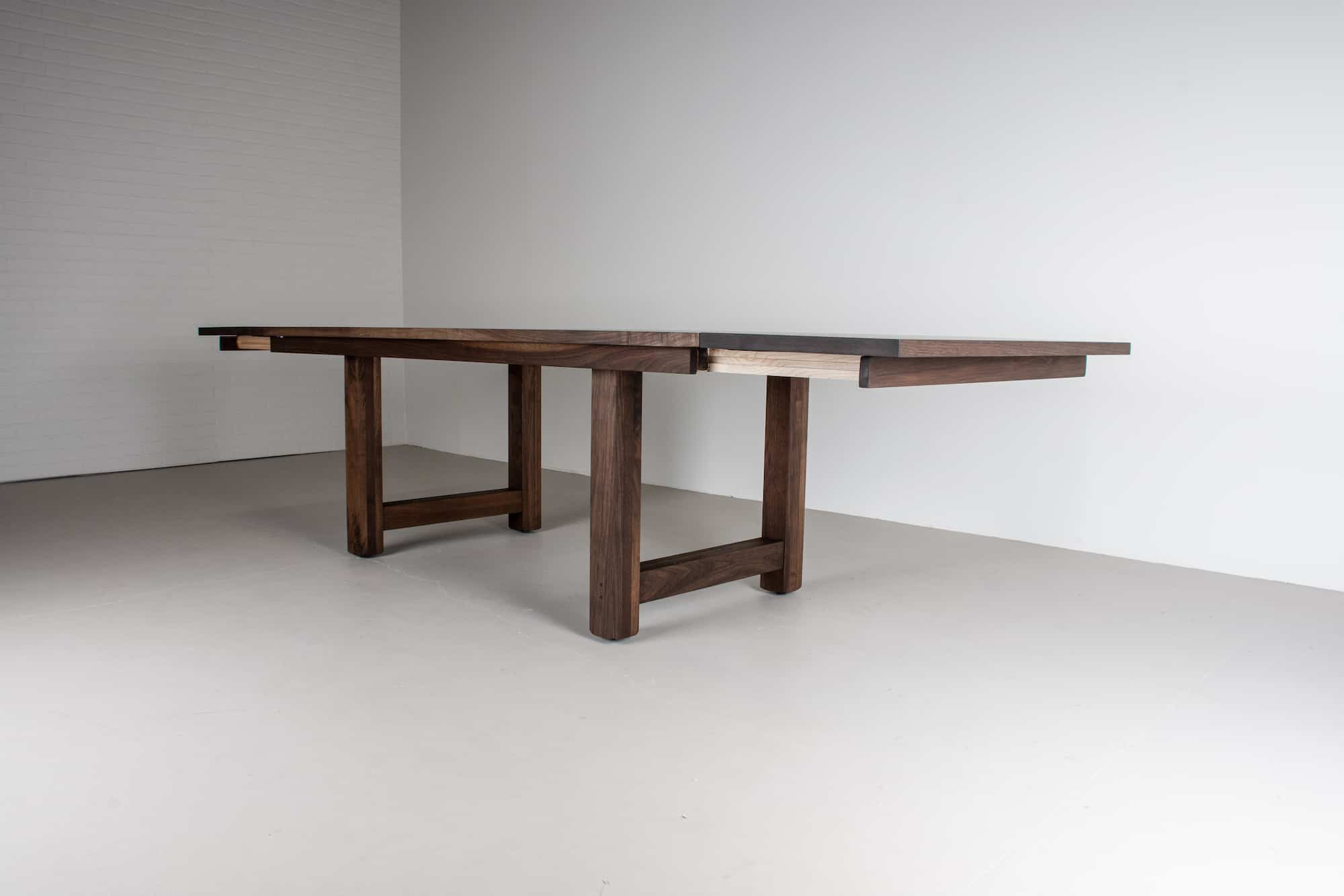 walnut extendable table on hawkin legs