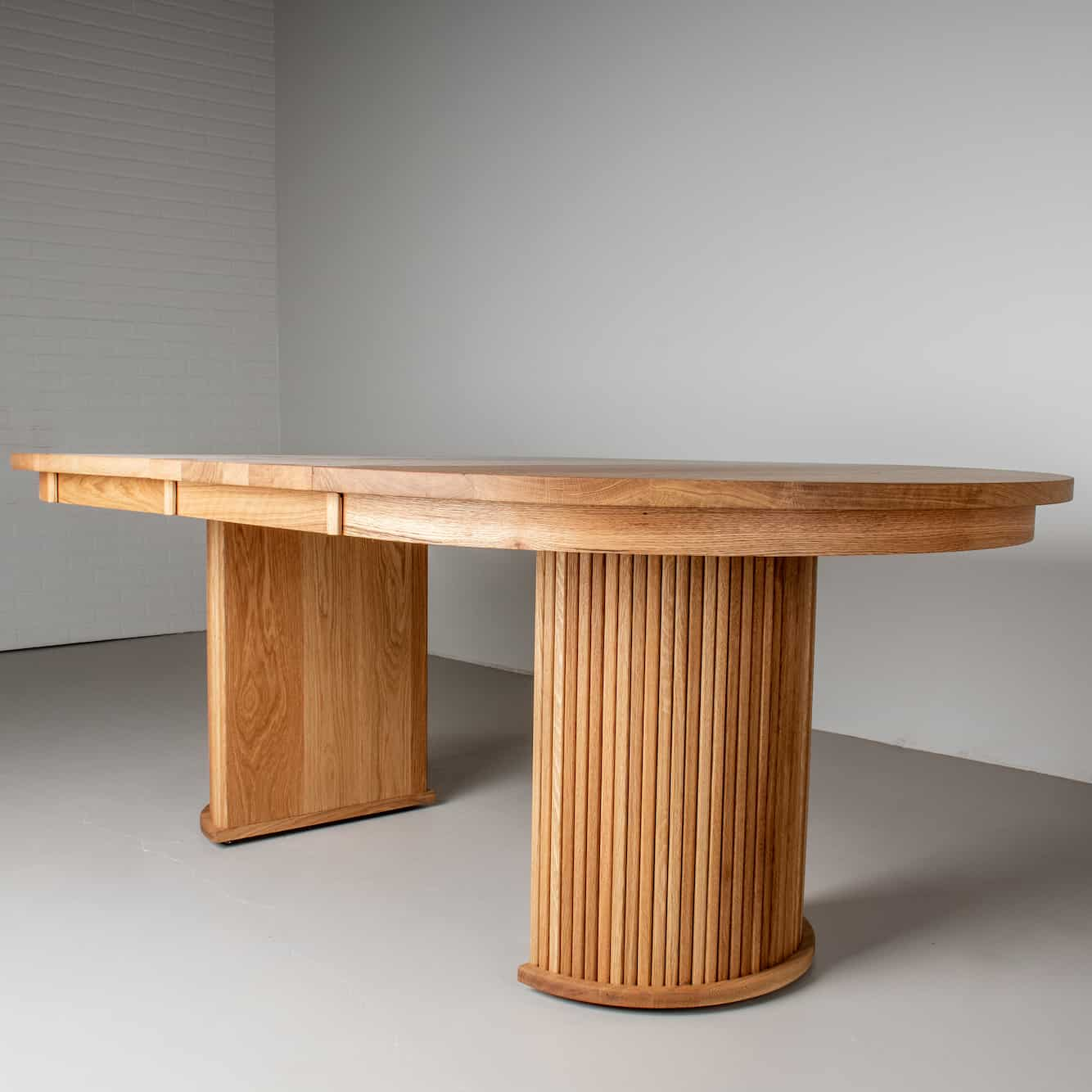 oval pedestal table on split base