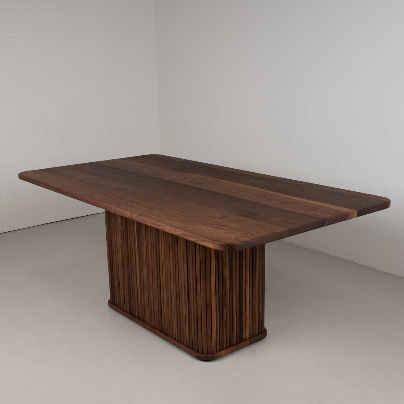 walnut rectangle table on pedestal base